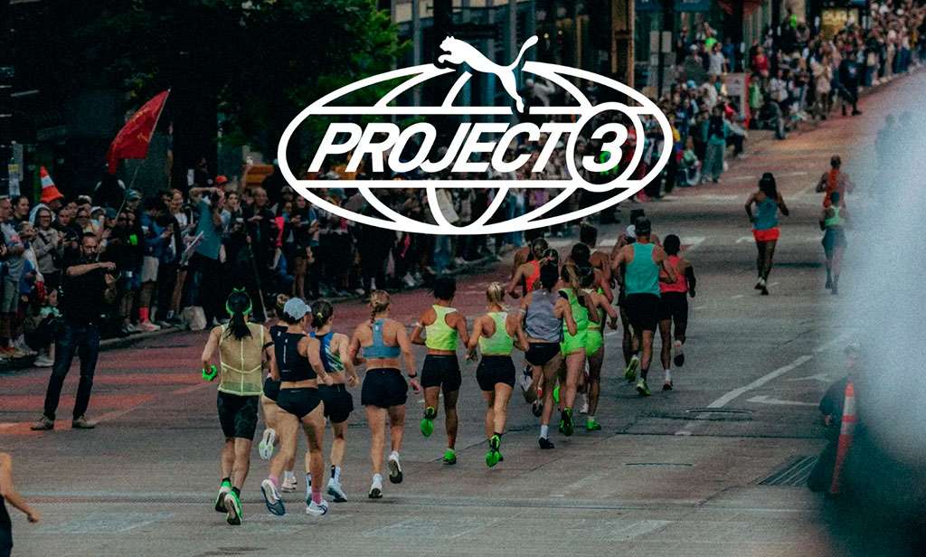 Corredores de PUMA PROJECT3 en la ruta de un maratón